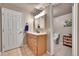 Well-maintained bathroom with a storage vanity and tile flooring at 10653 W Parkhill Dr, Littleton, CO 80127