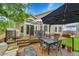 Outdoor deck perfect for entertaining, featuring patio furniture and BBQ at 10653 W Parkhill Dr, Littleton, CO 80127