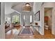 Bright foyer featuring tile flooring, high ceilings and a gorgeous window overlooking the front yard at 10653 W Parkhill Dr, Littleton, CO 80127