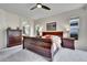 Comfortable main bedroom featuring carpeting, ample storage, and neutral colors at 10653 W Parkhill Dr, Littleton, CO 80127
