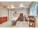 Functional home office space with neutral tones and ample workspace at 10653 W Parkhill Dr, Littleton, CO 80127