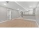 Spacious basement with laminate flooring, recessed lighting, and an open floor plan at 12992 W Jewell Cir, Lakewood, CO 80228