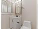 Bathroom with updated vanity, lighting, and modern fixtures at 12992 W Jewell Cir, Lakewood, CO 80228