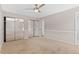 Large bedroom with spacious closet and neutral colors at 12992 W Jewell Cir, Lakewood, CO 80228