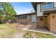 A well-maintained yard leads to the inviting entrance of this home, complemented by neat landscaping at 12992 W Jewell Cir, Lakewood, CO 80228