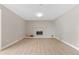 The living room features new flooring and a charming fireplace, ideal for relaxation at 12992 W Jewell Cir, Lakewood, CO 80228
