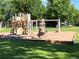 Community playground area with climbing structure and swings for Gathering fun at 4850 S Kittredge St, Aurora, CO 80015