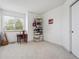 Bedroom with a large window, closet, desk, and open storage at 748 Poppywood Pl, Highlands Ranch, CO 80126