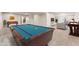 Finished basement featuring a pool table and ample recreational space at 627 Millbrook Cir, Castle Rock, CO 80109