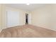 Spacious bedroom with closet and view to the hall and bathroom at 627 Millbrook Cir, Castle Rock, CO 80109