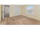Bright bedroom featuring neutral walls and carpeting, closet, and natural light at 627 Millbrook Cir, Castle Rock, CO 80109
