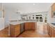Bright kitchen with stainless steel dishwasher, custom tile backsplash, and plenty of natural light at 627 Millbrook Cir, Castle Rock, CO 80109