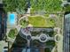 Stunning aerial view of a courtyard with lush landscaping, swimming pool, and walkways at 4801 E 9Th Ave # 402S, Denver, CO 80220