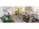Comfortable living room showcasing hardwood floors, exposed beam ceiling and plenty of seating space at 4801 E 9Th Ave # 402S, Denver, CO 80220