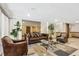 Warm and inviting lobby with comfortable brown leather sofas and lounge chairs at 4801 E 9Th Ave # 402S, Denver, CO 80220