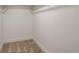 A clean, empty closet with shelving and ample space, ready for storage and organization at 14150 E Temple Dr # V06, Aurora, CO 80015