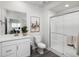 Modern bathroom with a glass-enclosed shower, sleek vanity, and contemporary decor offering a relaxing and stylish space at 14492 Pansy Loop, Morrison, CO 80465