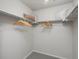 Walk-in closet with double shelving and plenty of storage space for an organized wardrobe and other personal items at 14492 Pansy Loop, Morrison, CO 80465
