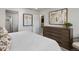Main bedroom with neutral decor and view of the bedroom entry at 14492 Pansy Loop, Morrison, CO 80465