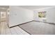 Bright bedroom with large window and neutral carpet and tile flooring with full length mirror at 707 W 96Th Ave # 5, Thornton, CO 80260