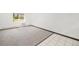Bright bedroom with large window and neutral carpet and tile flooring at 707 W 96Th Ave # 5, Thornton, CO 80260