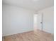 This bedroom features hardwood floors, closet, and white trim for a crisp, clean design at 3110 W 66Th Ave, Denver, CO 80221