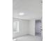 This room features a new window, ceiling light, white walls, and carpeted floors at 3110 W 66Th Ave, Denver, CO 80221