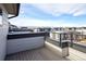 View from the spacious deck showcases community with mountain views at 8722 E 47Th Ave, Denver, CO 80238
