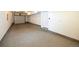 Spacious two-car garage with clean concrete floors and well-lit interiors at 8722 E 47Th Ave, Denver, CO 80238
