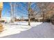 Large backyard covered in snow at 1506 Maple Dr, Berthoud, CO 80513