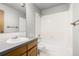 Simple bathroom with tub and vanity at 1506 Maple Dr, Berthoud, CO 80513