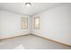 Bedroom with two windows and carpet flooring at 1506 Maple Dr, Berthoud, CO 80513