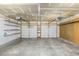 Spacious two-car garage with built-in shelving at 1506 Maple Dr, Berthoud, CO 80513