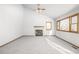 Living room with fireplace and vaulted ceiling at 1506 Maple Dr, Berthoud, CO 80513