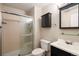 Updated bathroom with sleek vanity, glass enclosed shower, and modern finishes at 13744 E Lehigh Ave # B, Aurora, CO 80014