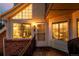 A well lit, welcoming entrance with a unique triangular window and a cozy front porch at 13744 E Lehigh Ave # B, Aurora, CO 80014