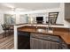 Kitchen with stainless steel sink and view of living and dining areas at 13744 E Lehigh Ave # B, Aurora, CO 80014