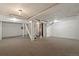 Unfinished basement featuring carpet, stairs, and a utility area awaiting customization at 3147 W 39Th Ave, Denver, CO 80211