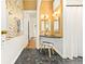 Stylish bathroom featuring a vanity, accent lighting, marble floors, and unique wallpaper at 3147 W 39Th Ave, Denver, CO 80211