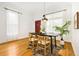 Bright dining room featuring hardwood floors and natural light at 3147 W 39Th Ave, Denver, CO 80211
