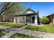Charming single-story home with a quaint front porch, landscaped garden, and inviting curb appeal at 3147 W 39Th Ave, Denver, CO 80211