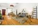 Bright living room features hardwood floors, decorative rug, modern furniture and a cozy seating area at 3147 W 39Th Ave, Denver, CO 80211