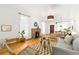 Inviting living room with hardwood floors, stone fireplace and an open layout at 3147 W 39Th Ave, Denver, CO 80211