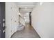 Inviting entryway with wood-look floors, white walls, and stairs leading to the upper level of the home at 4028 N Rome St, Aurora, CO 80019