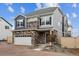 Charming two-story home showcasing stone accents and neutral siding at 4028 N Rome St, Aurora, CO 80019