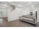 Inviting living room showcasing wood floors with seamless flow into the kitchen at 4028 N Rome St, Aurora, CO 80019