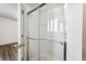 Clean and functional bathroom featuring a glass-enclosed shower at 13095 W Cedar Dr # 302, Lakewood, CO 80228