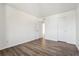 Spacious bedroom with modern flooring, fresh white walls, and a large closet at 13095 W Cedar Dr # 302, Lakewood, CO 80228