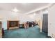 Spacious basement area with a fireplace, offering potential for a recreation room, storage, or home gym at 2108 S Idalia S St, Aurora, CO 80013