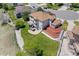 High aerial view of the home shows the large, private backyard, mature landscaping and neighborhood at 7226 Dove Ct, Parker, CO 80134